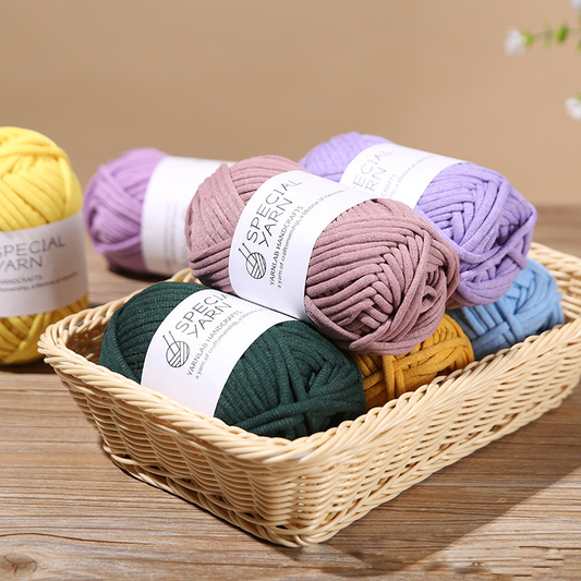 30ling hand-k'ai soft yarn, solid color, thick and fine style, bamboo basket packaging with white label "Shausted Yarn", multiple colors of the knit ball in front of them, high resolution photography, natural light, product photography